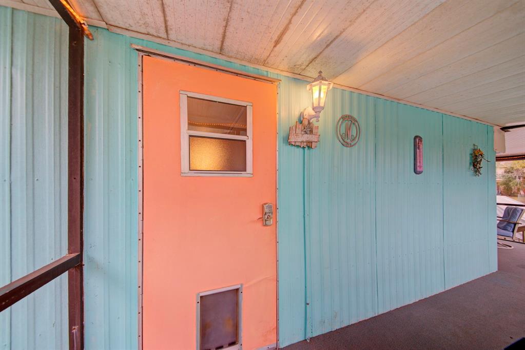 6427 West Richard Drive Weeki Wachee, FL 34607 - Photo 6 of 35 a front door view of a house
