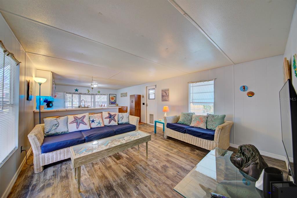 6427 West Richard Drive Weeki Wachee, FL 34607 - Photo 7 of 35 a living room with furniture and a wooden floor