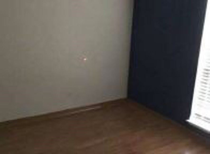 5052 South Colony Boulevard The Colony, TX 75056 - Photo 5 of 9 an empty room with a window