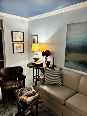 a living room with furniture and a couch