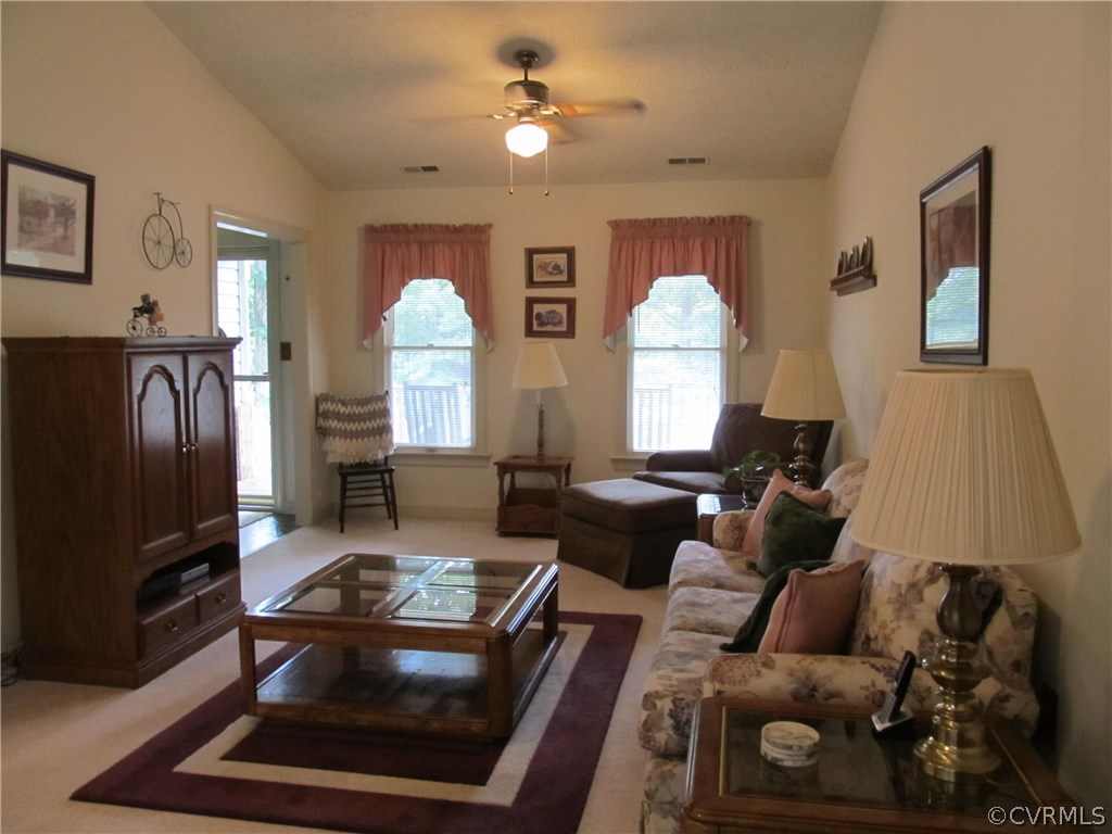 11018 Rufford Road Chester, VA 23831 - Photo 14 of 23 a living room with furniture and a flat screen tv
