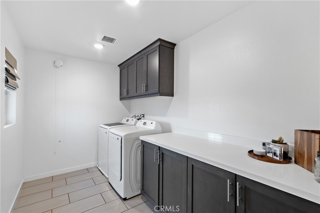28341 Heather Grn Way Menifee, CA 92584 - Photo 13 of 44 Main house, laundry room upstairs