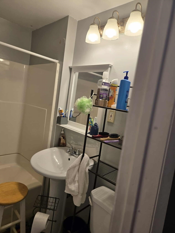 78 San Miguel Street Springfield, MA 01104 - Photo 9 of 26 a view of a room with furniture and wooden floor