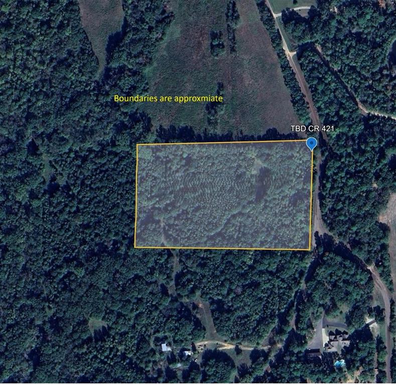 421 County Road 421 Tyler, TX 75704 - Photo 17 of 17 a sign that is sitting on a rock