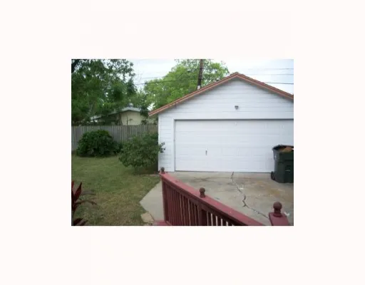 a view of kitchen with a sink and yard