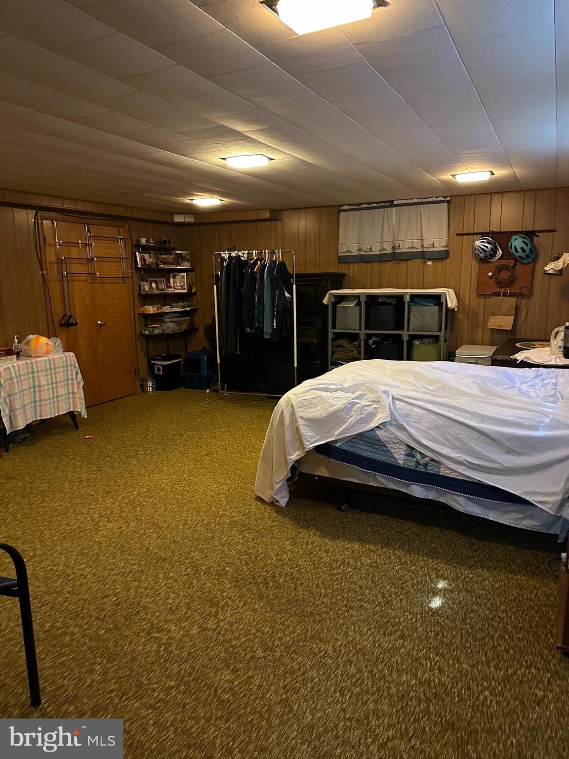 160 Silver Lake Road Bridgeton, NJ 08302 - Photo 16 of 28 a bedroom with bed and a walk in closet