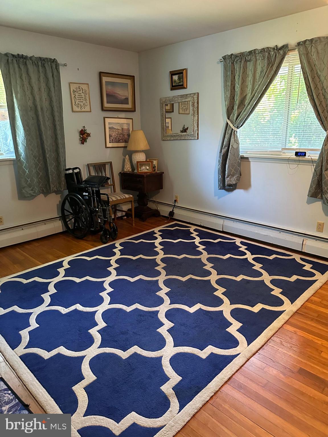 160 Silver Lake Road Bridgeton, NJ 08302 - Photo 24 of 28 a living room with rug outdoor space and a rug
