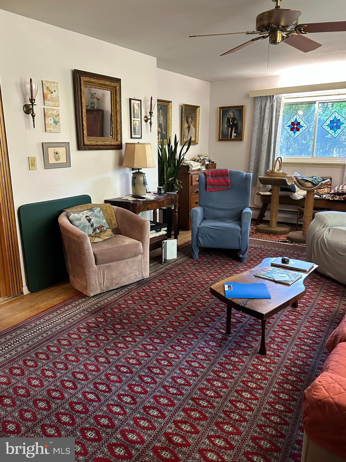 160 Silver Lake Road Bridgeton, NJ 08302 - Photo 10 of 28 a living room with furniture and a wooden floor