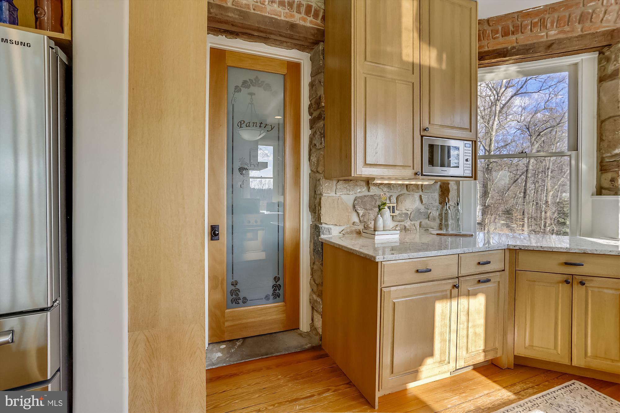 5417 Mohican Road Bethesda, MD 20816 - Photo 17 of 100 a view of a bathroom with a sink and a mirror