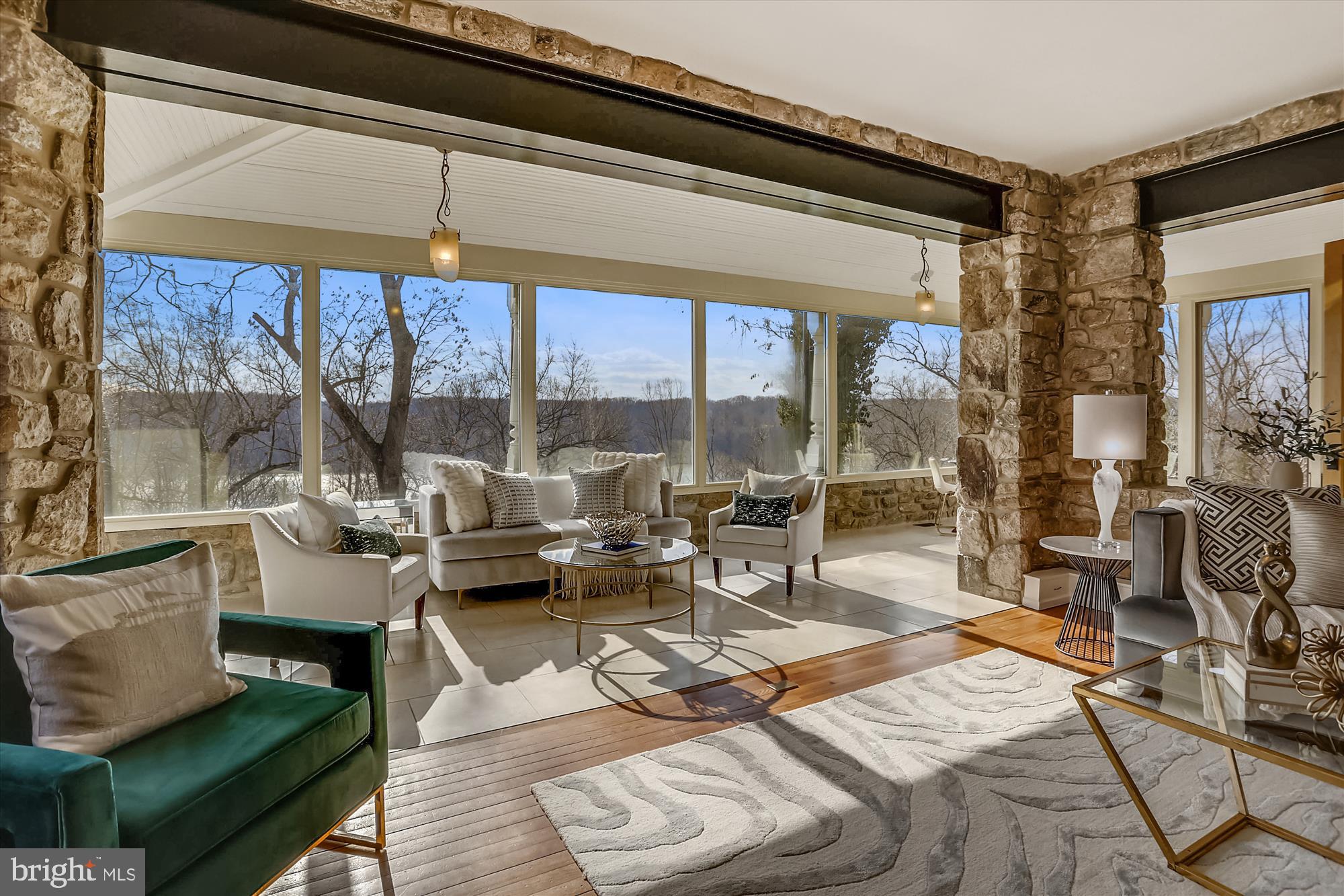 5417 Mohican Road Bethesda, MD 20816 - Photo 29 of 100 a living room with patio furniture and a floor to ceiling window