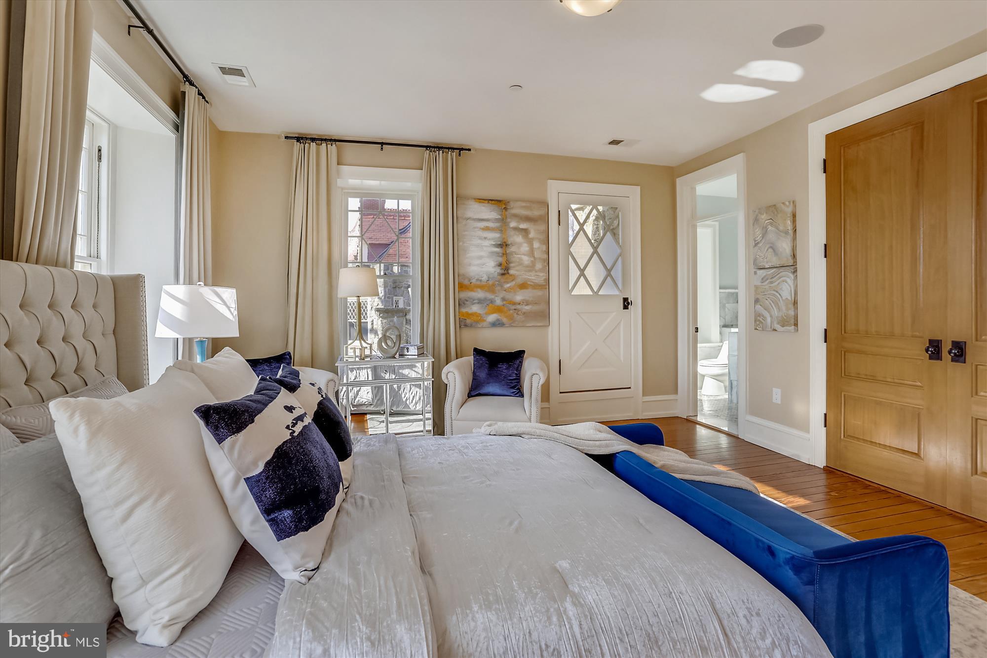 5417 Mohican Road Bethesda, MD 20816 - Photo 42 of 100 a bed room with a bed and a fireplace