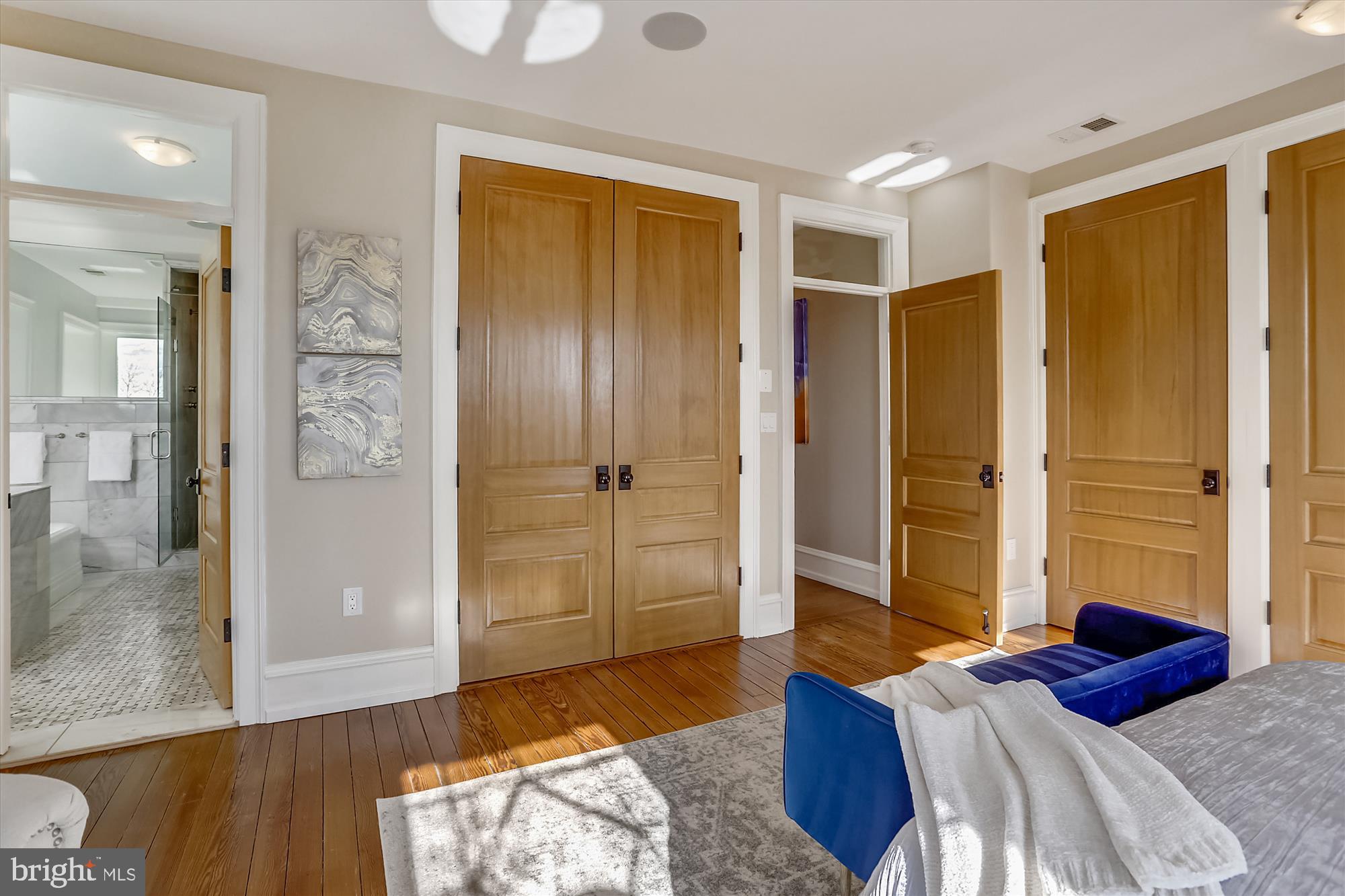 5417 Mohican Road Bethesda, MD 20816 - Photo 45 of 100 a bedroom with a bed and a walk in closet