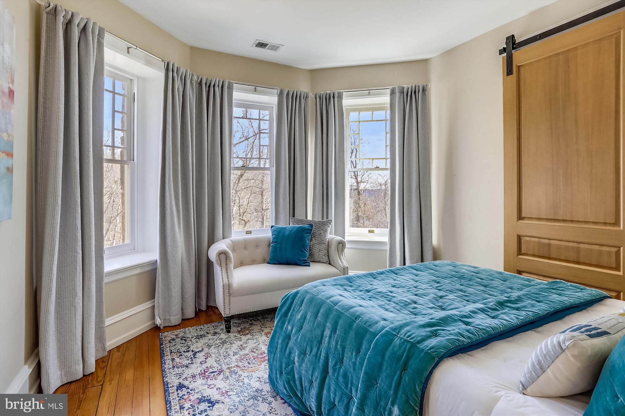 5417 Mohican Road Bethesda, MD 20816 - Photo 51 of 100 a bedroom with a bed couch and a window