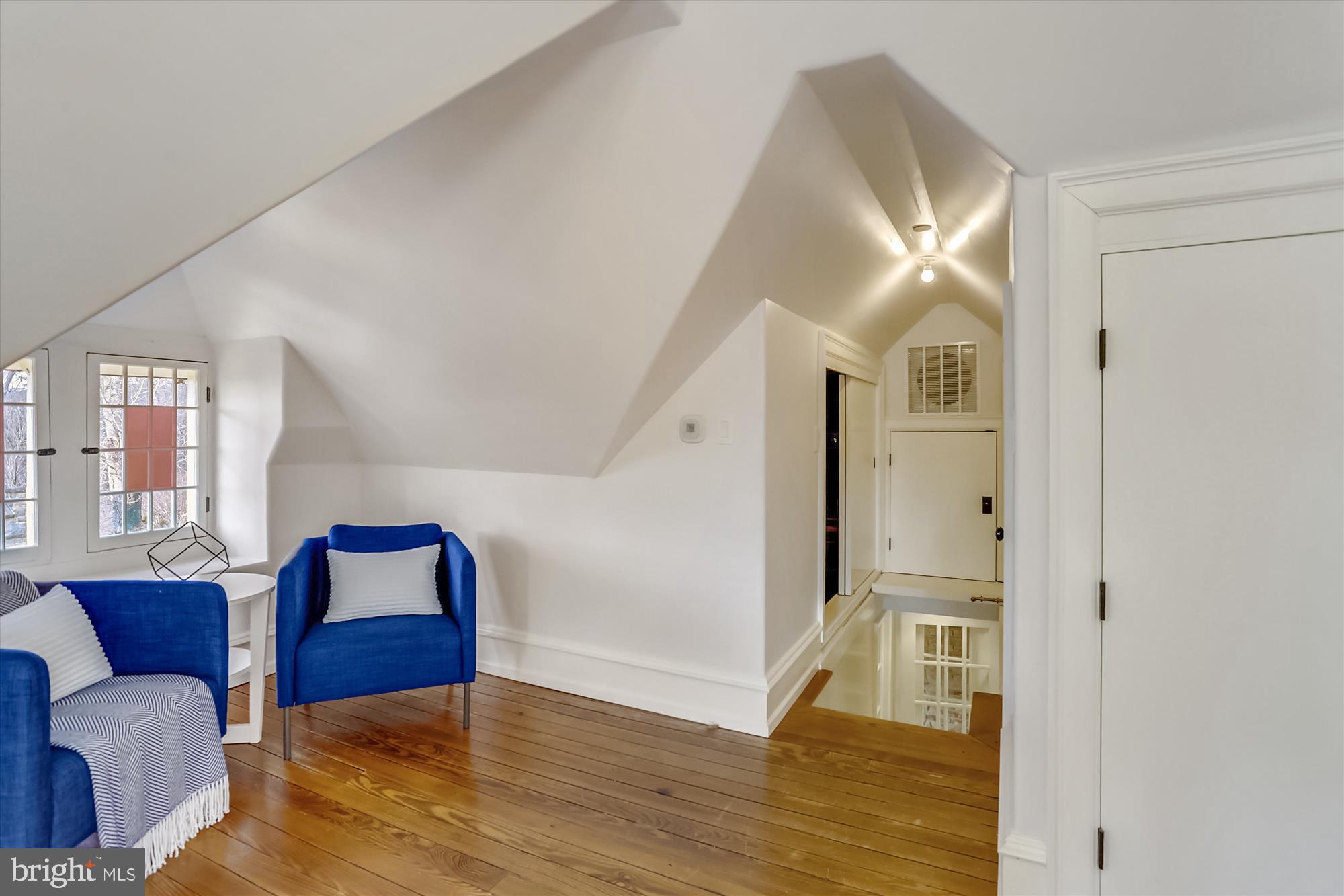 5417 Mohican Road Bethesda, MD 20816 - Photo 65 of 100 a view of a livingroom with furniture and wooden floor