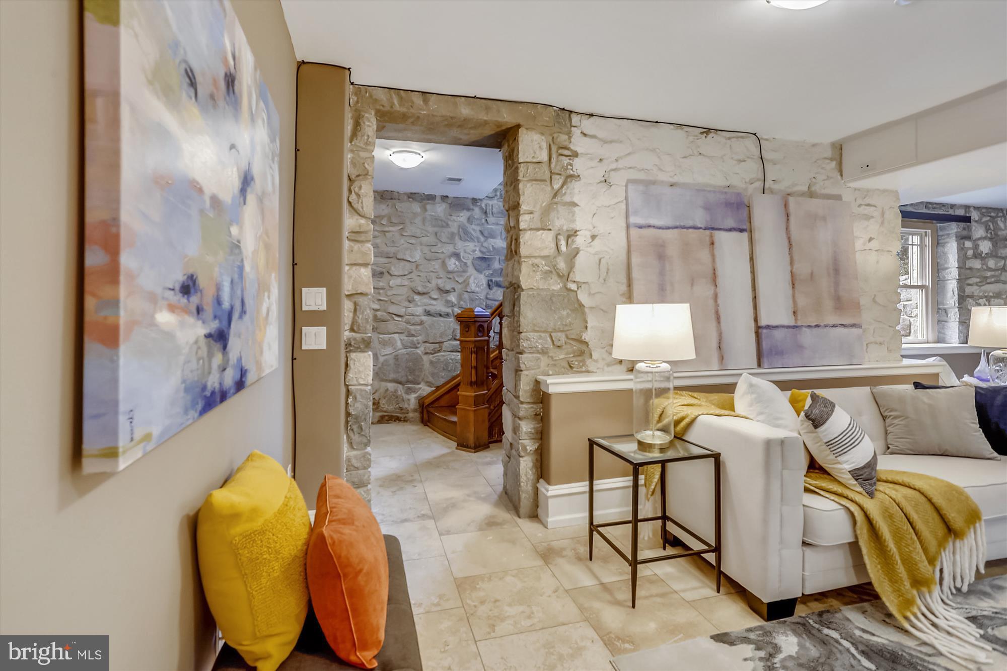 5417 Mohican Road Bethesda, MD 20816 - Photo 72 of 100 a living room with furniture and a painting on the wall