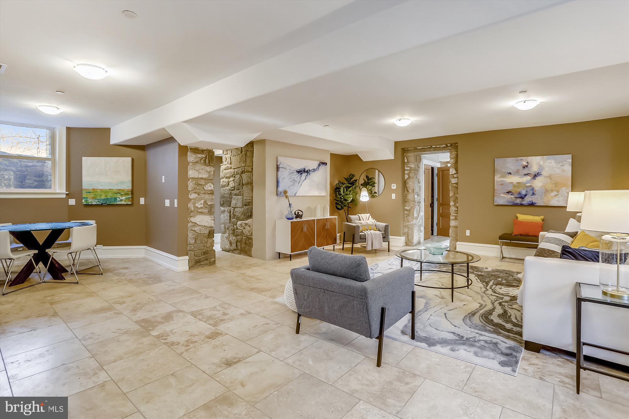 5417 Mohican Road Bethesda, MD 20816 - Photo 78 of 100 a view of a livingroom with workspace and a couch