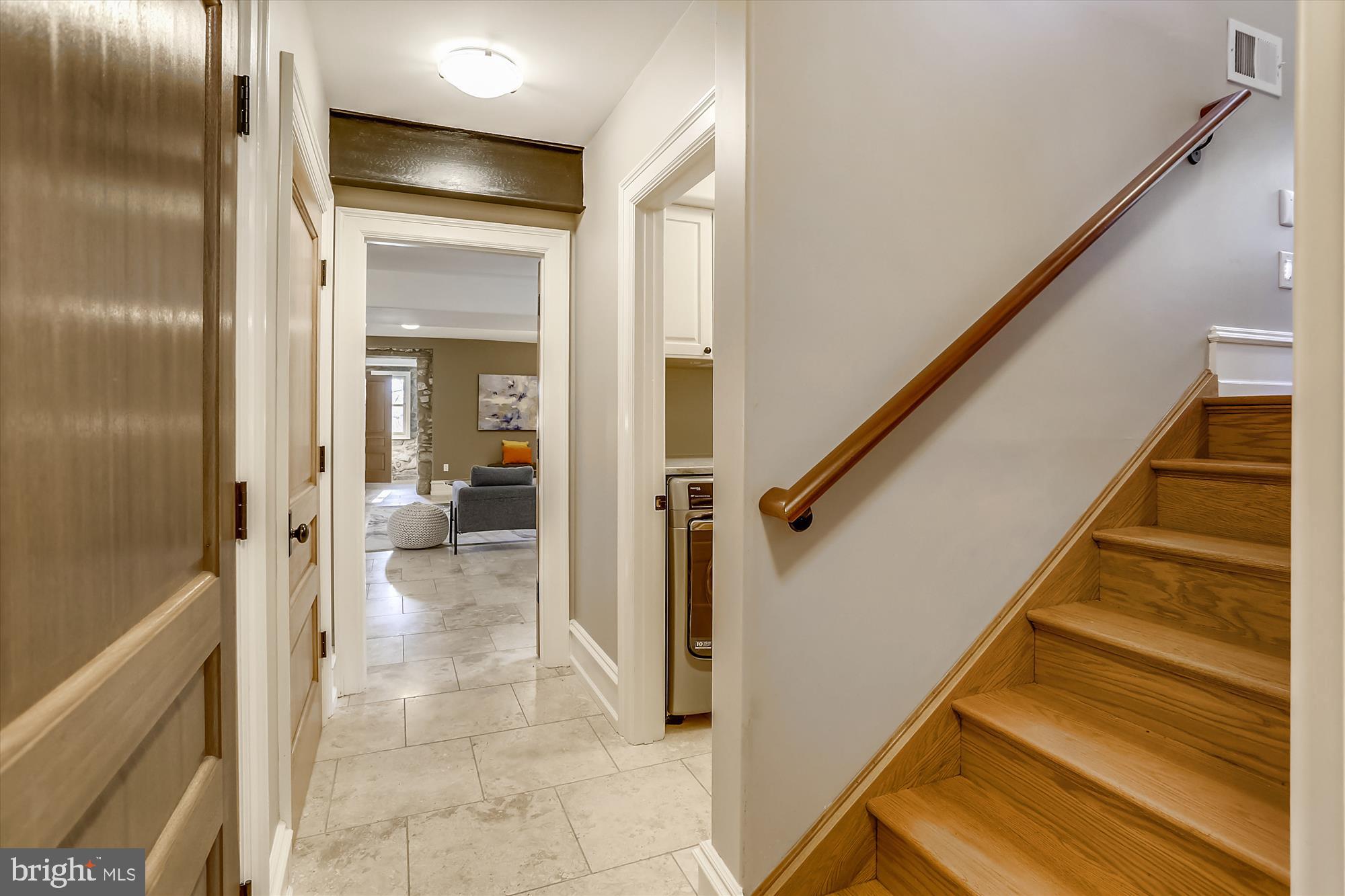 5417 Mohican Road Bethesda, MD 20816 - Photo 88 of 100 a view of a hallway with wooden floor and staircase
