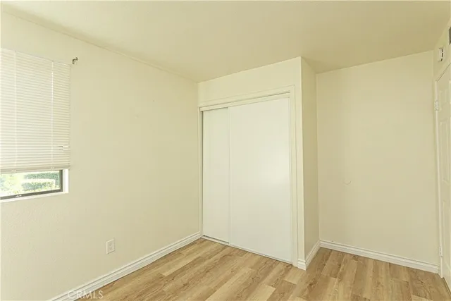 a view of a room that has a window in it