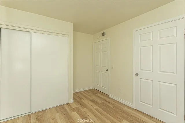 a bathroom with a toilet and shower