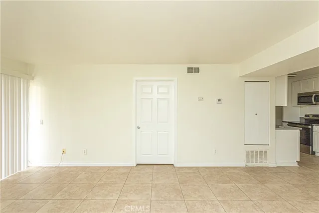 a view of a kitchen with a sink
