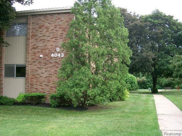 4043 West Maple Road, Unit 202 Bloomfield Hills, MI 48301 - Photo 1 of 15 maple front.jpg
