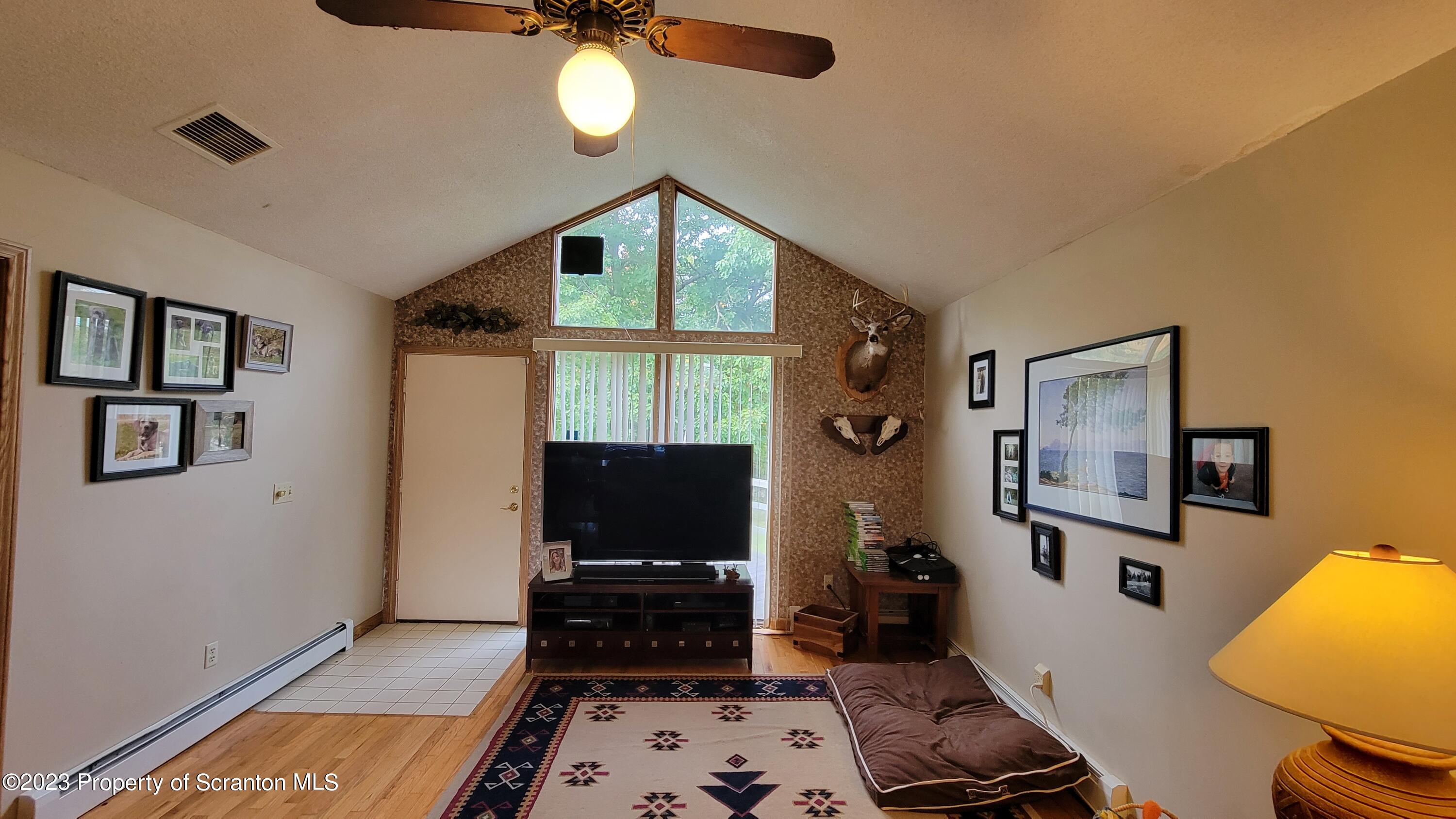 618 Kennedy Road Brackney, PA 18812 - Photo 15 of 35 a bedroom with furniture and a window