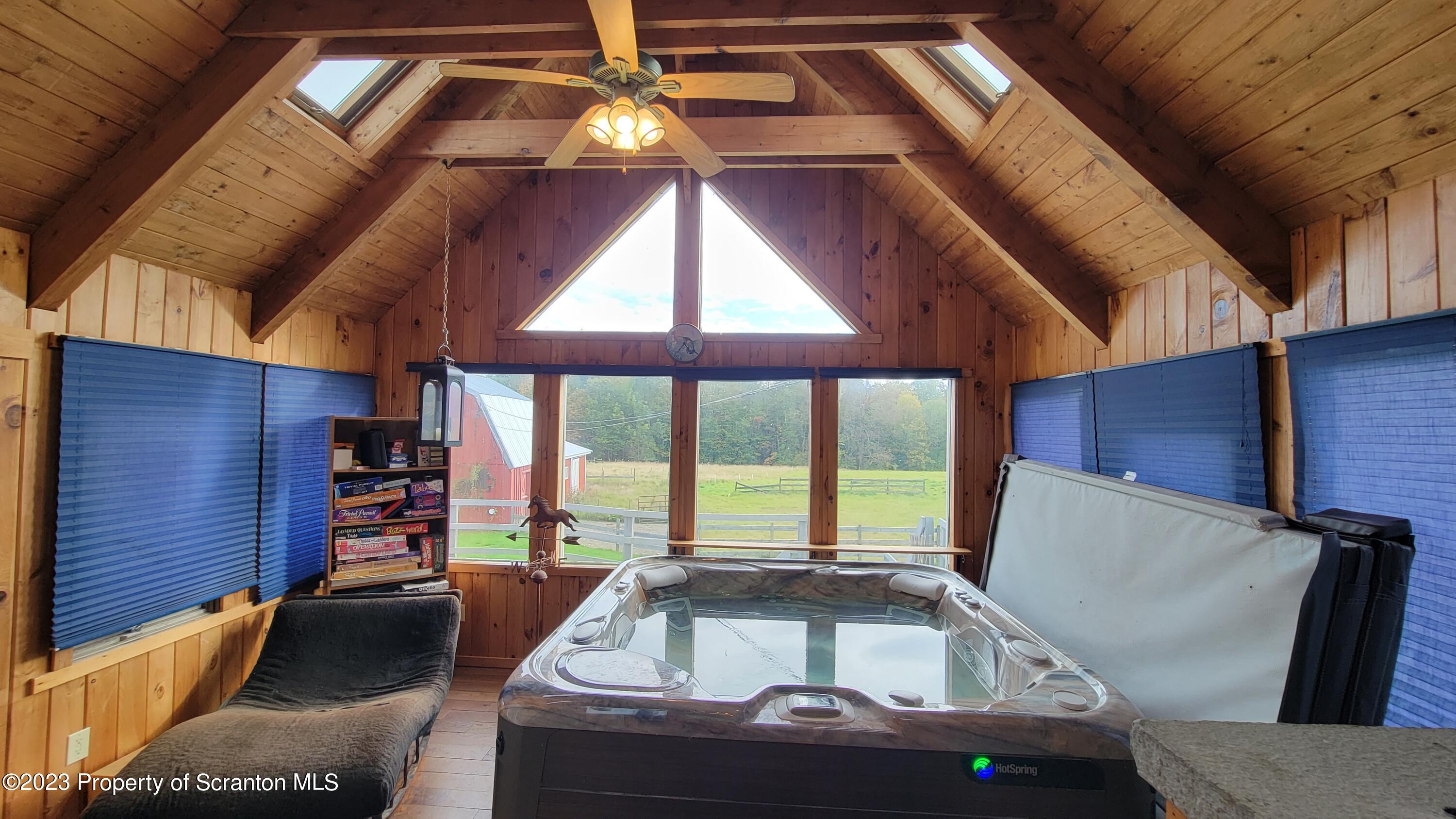 618 Kennedy Road Brackney, PA 18812 - Photo 17 of 35 a view of kitchen with furniture and large windows