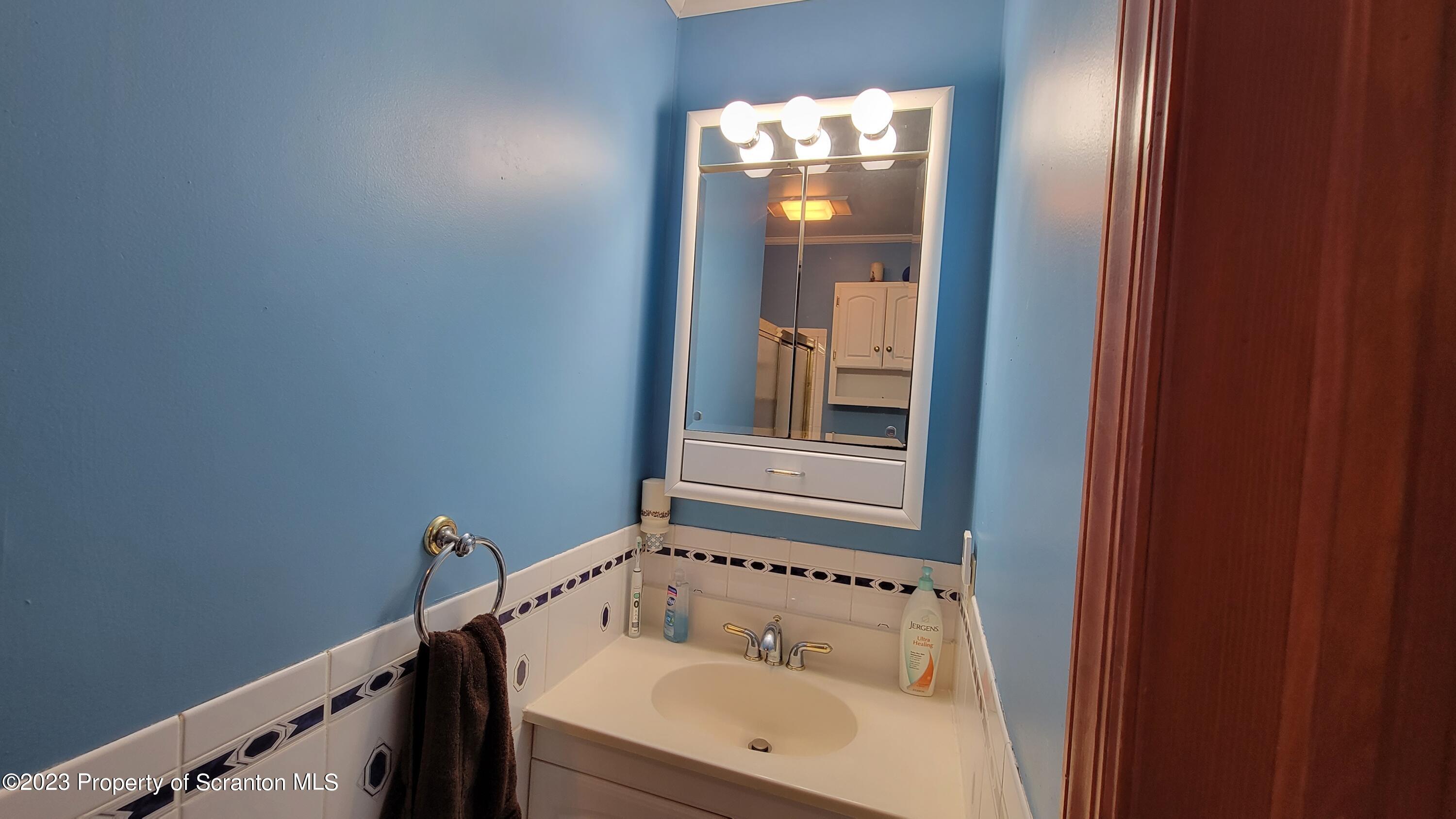 618 Kennedy Road Brackney, PA 18812 - Photo 20 of 35 a bathroom with a bathtub and a sink