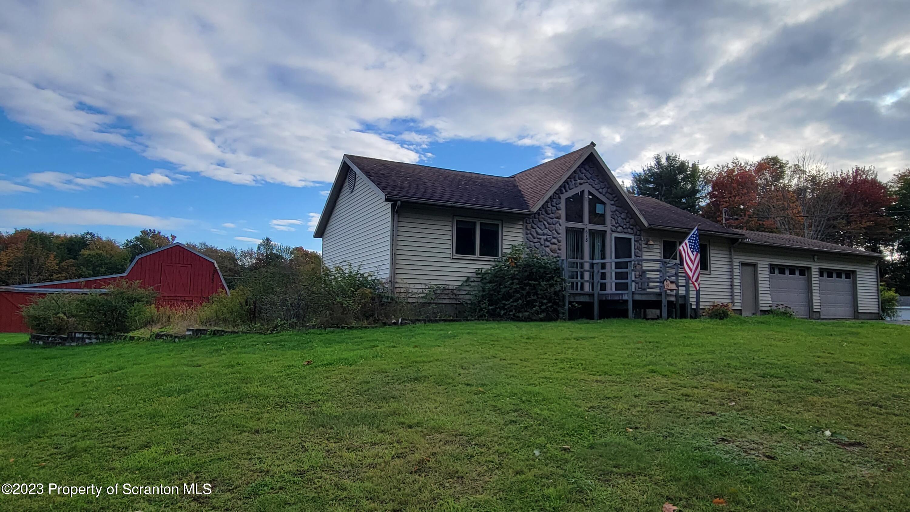618 Kennedy Road Brackney, PA 18812 - Photo 2 of 35 a view of a yard in front of house