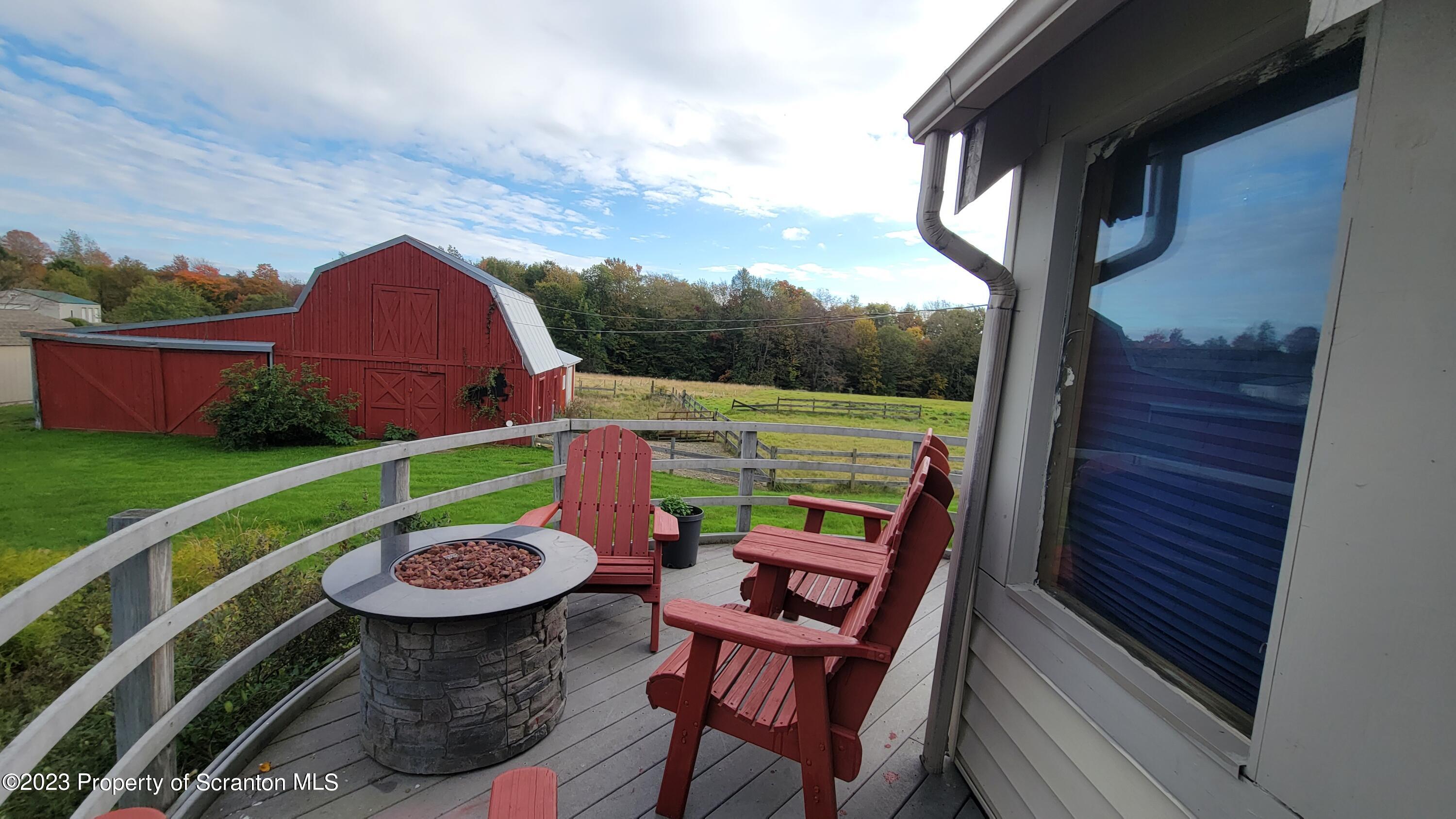 618 Kennedy Road Brackney, PA 18812 - Photo 7 of 35 a view of an outdoor sitting area with garden