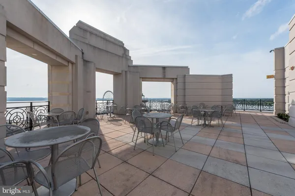 a view of swimming pool from a balcony