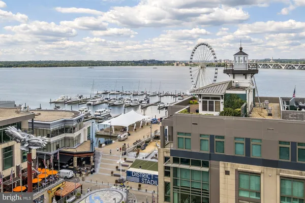 a view of roof deck with patio