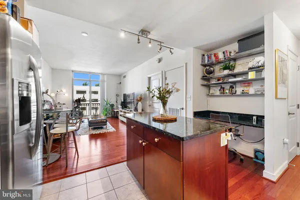 a kitchen with granite countertop lots of counter top space