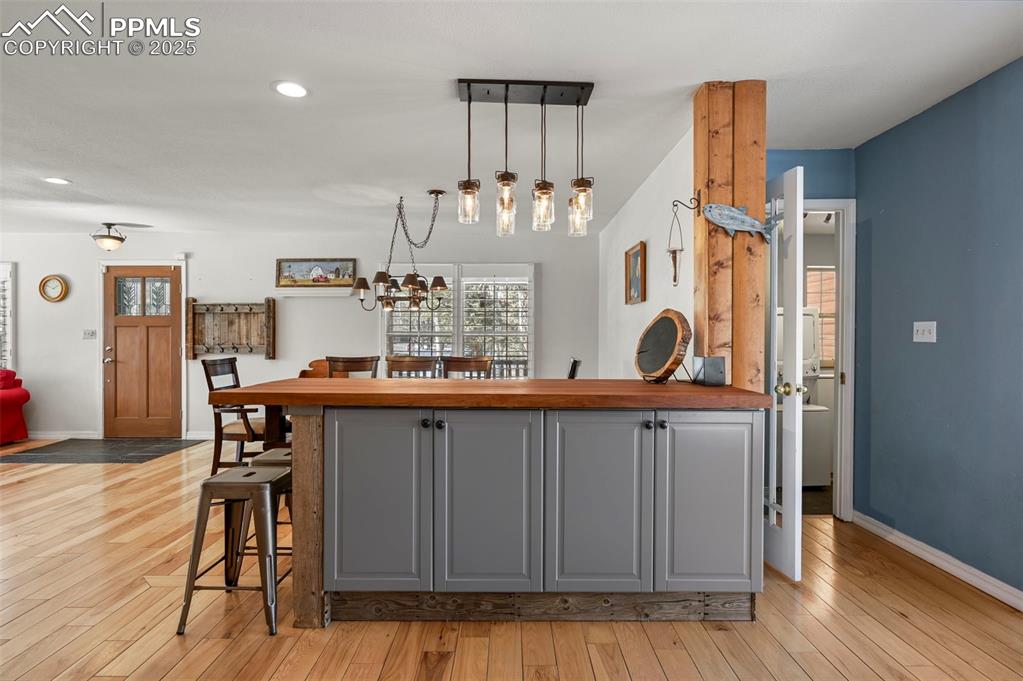 284 County Road 511 Divide, CO 80814 - Photo 12 of 49 a kitchen with a sink cabinets and wooden floor