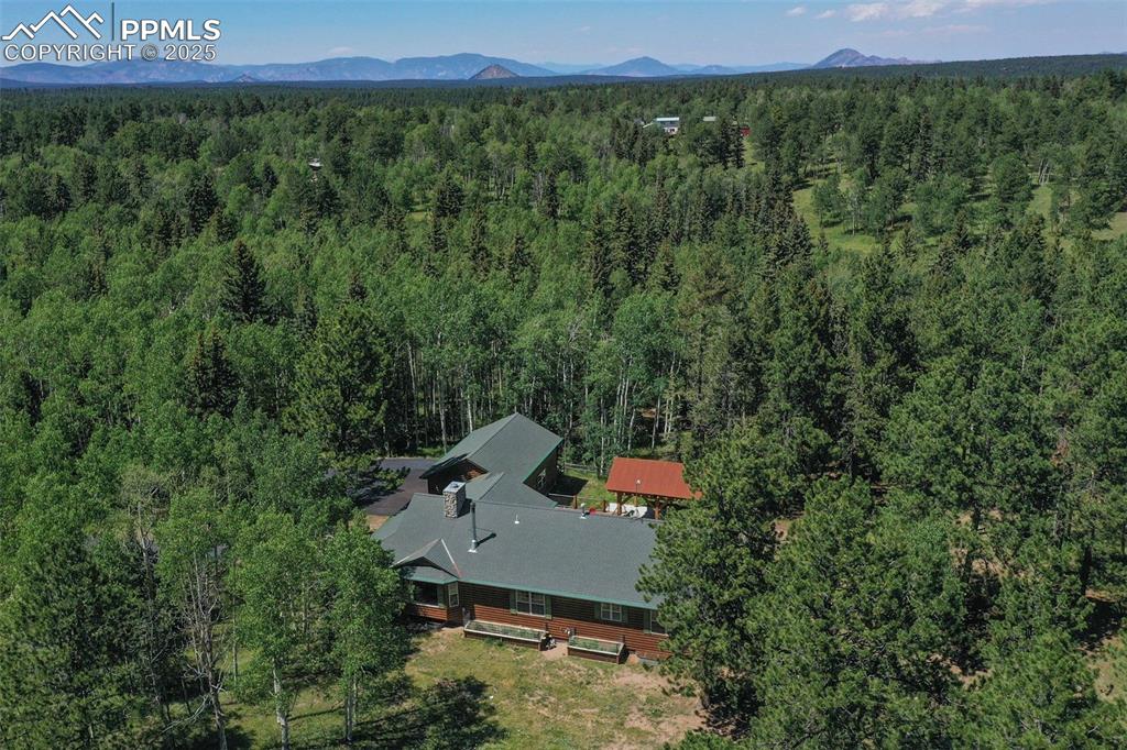 284 County Road 511 Divide, CO 80814 - Photo 45 of 49 an aerial view of a house with a yard