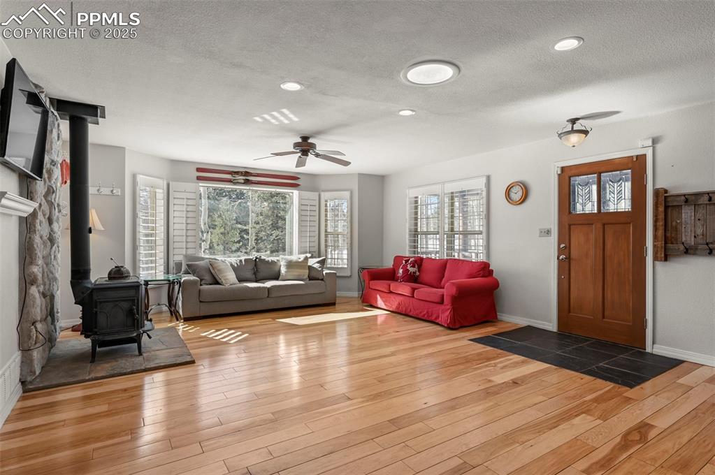 284 County Road 511 Divide, CO 80814 - Photo 7 of 49 a living room with furniture window and wooden floor