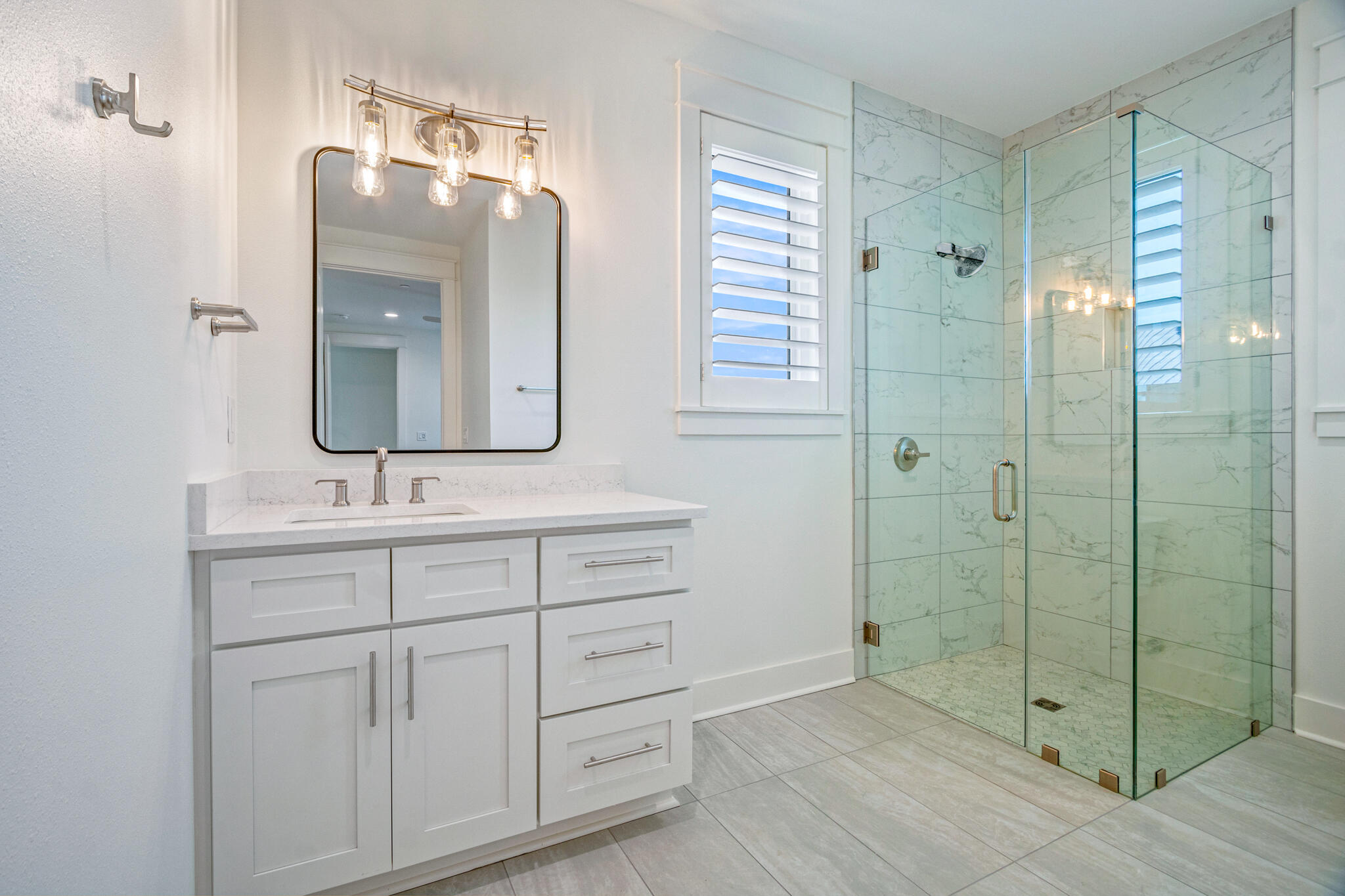 40 Cote D Azur Drive Santa Rosa Beach, FL 32459 - Photo 49 of 92 a bathroom with a double vanity sink mirror and shower