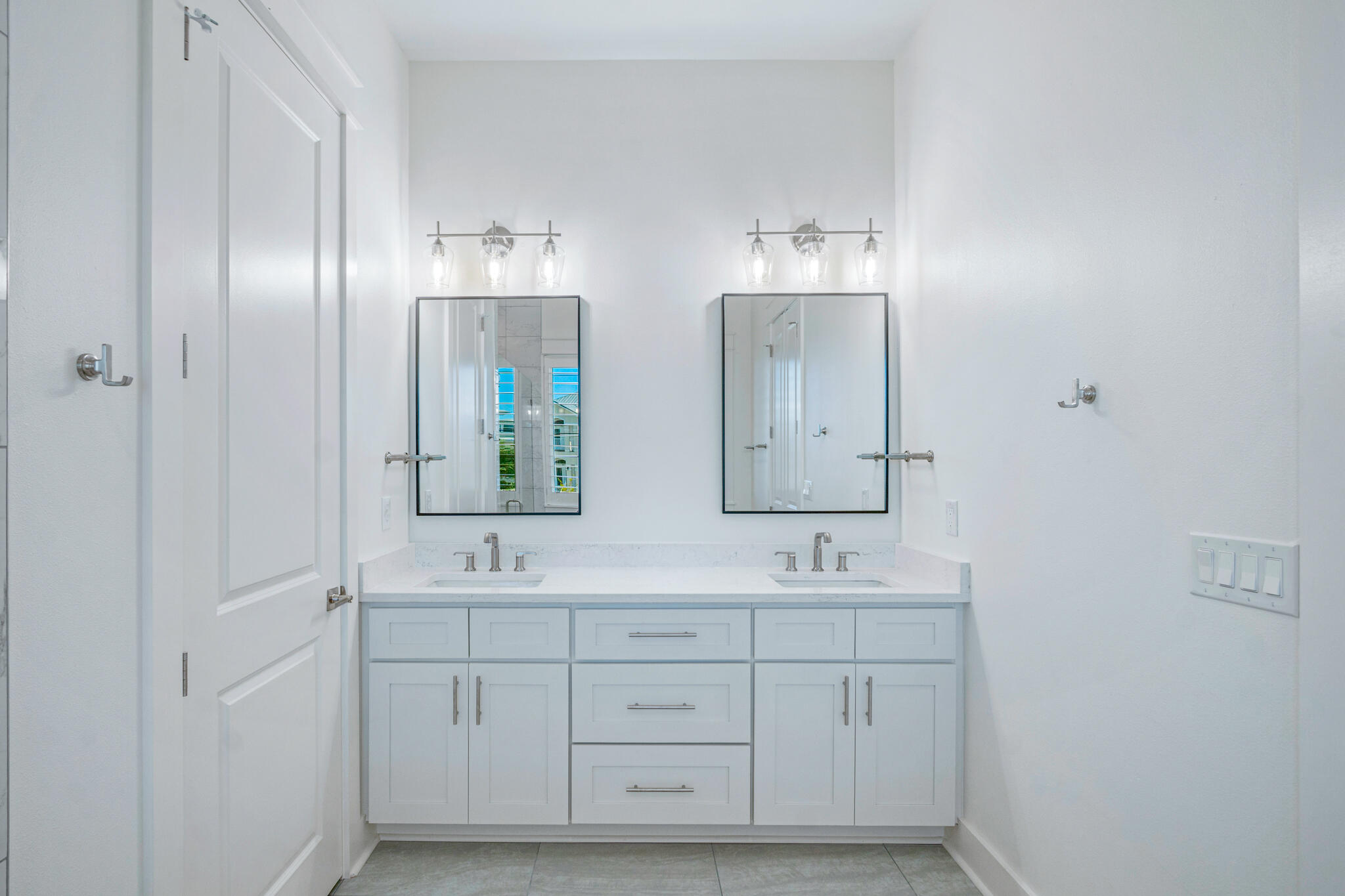 40 Cote D Azur Drive Santa Rosa Beach, FL 32459 - Photo 56 of 92 a bathroom with double vanity sink two mirror and a vanity
