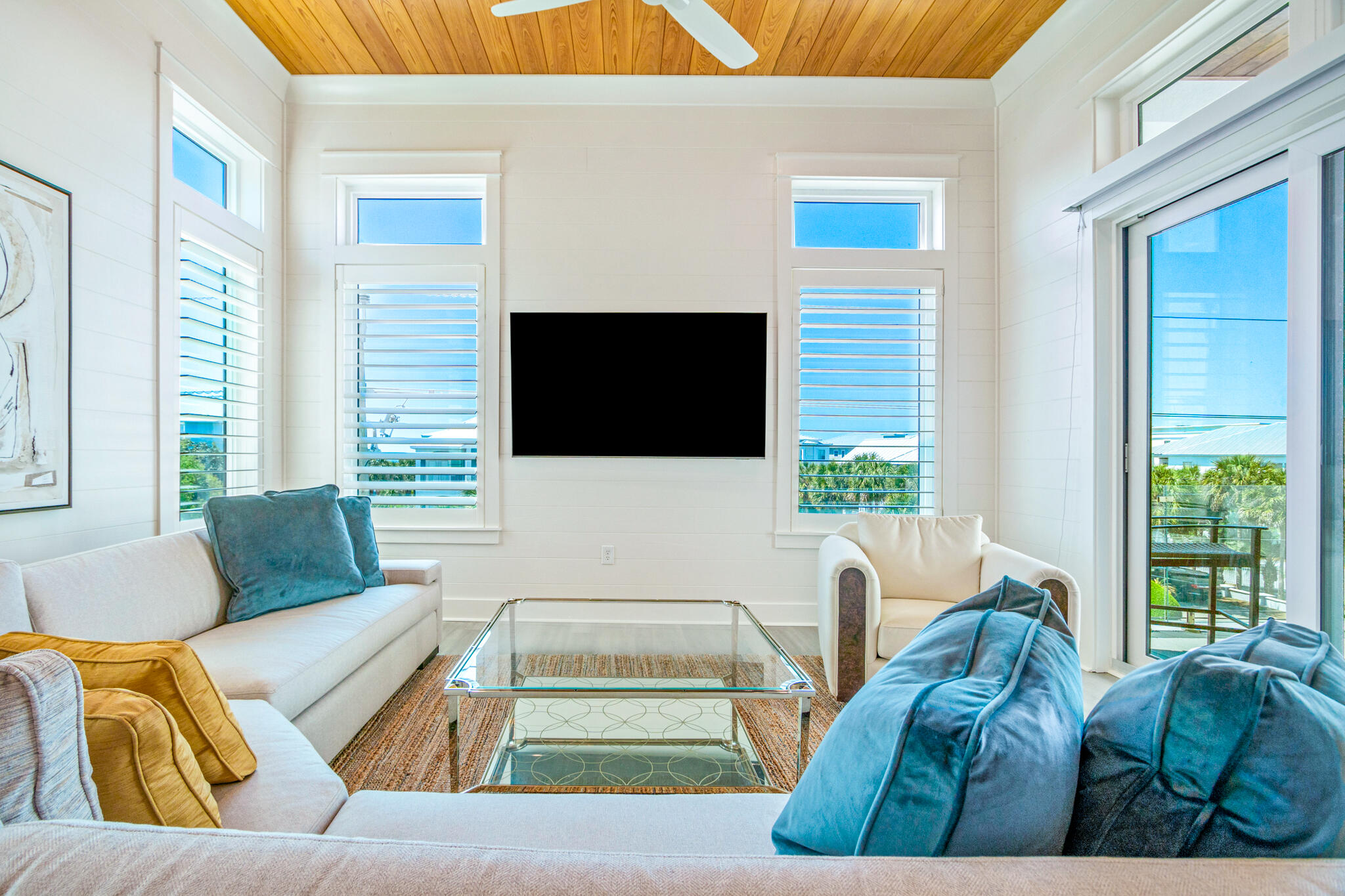 40 Cote D Azur Drive Santa Rosa Beach, FL 32459 - Photo 61 of 92 a living room with furniture and a flat screen tv