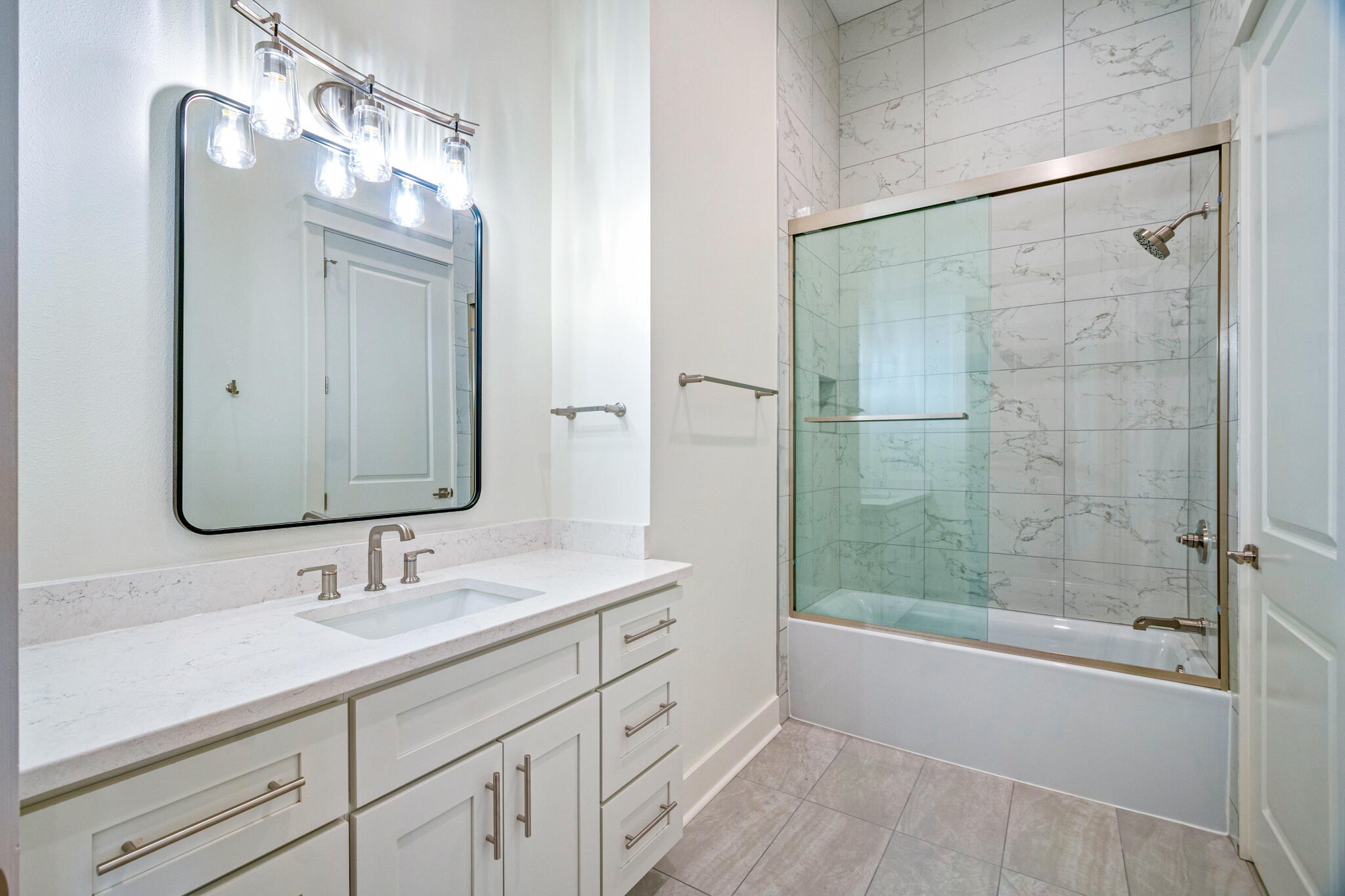 40 Cote D Azur Drive Santa Rosa Beach, FL 32459 - Photo 64 of 92 a bathroom with a double vanity sink mirror and shower
