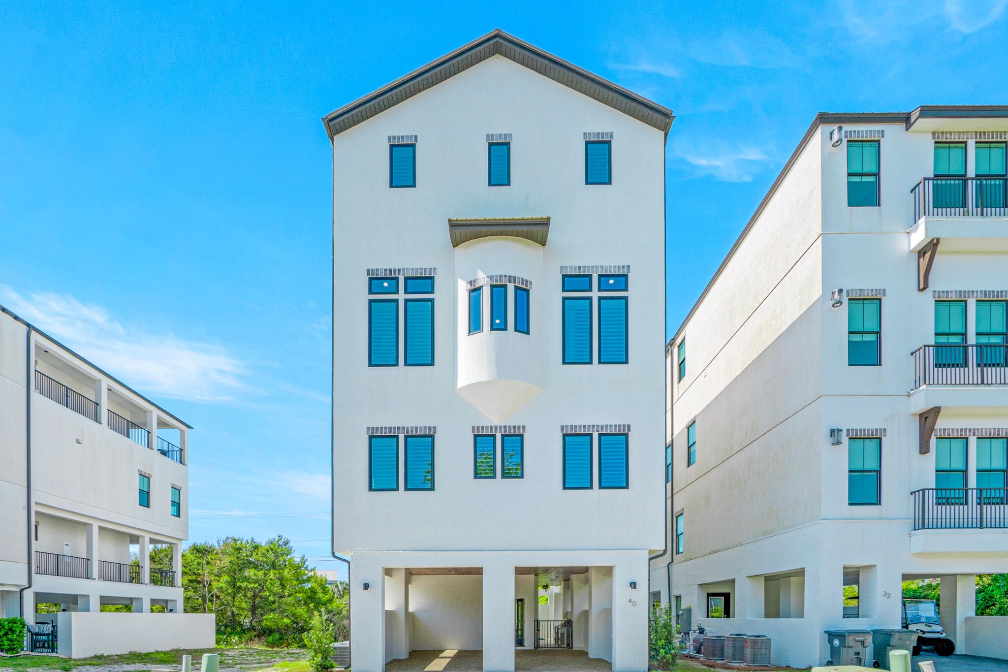 40 Cote D Azur Drive Santa Rosa Beach, FL 32459 - Photo 85 of 92 a front view of a multi story building
