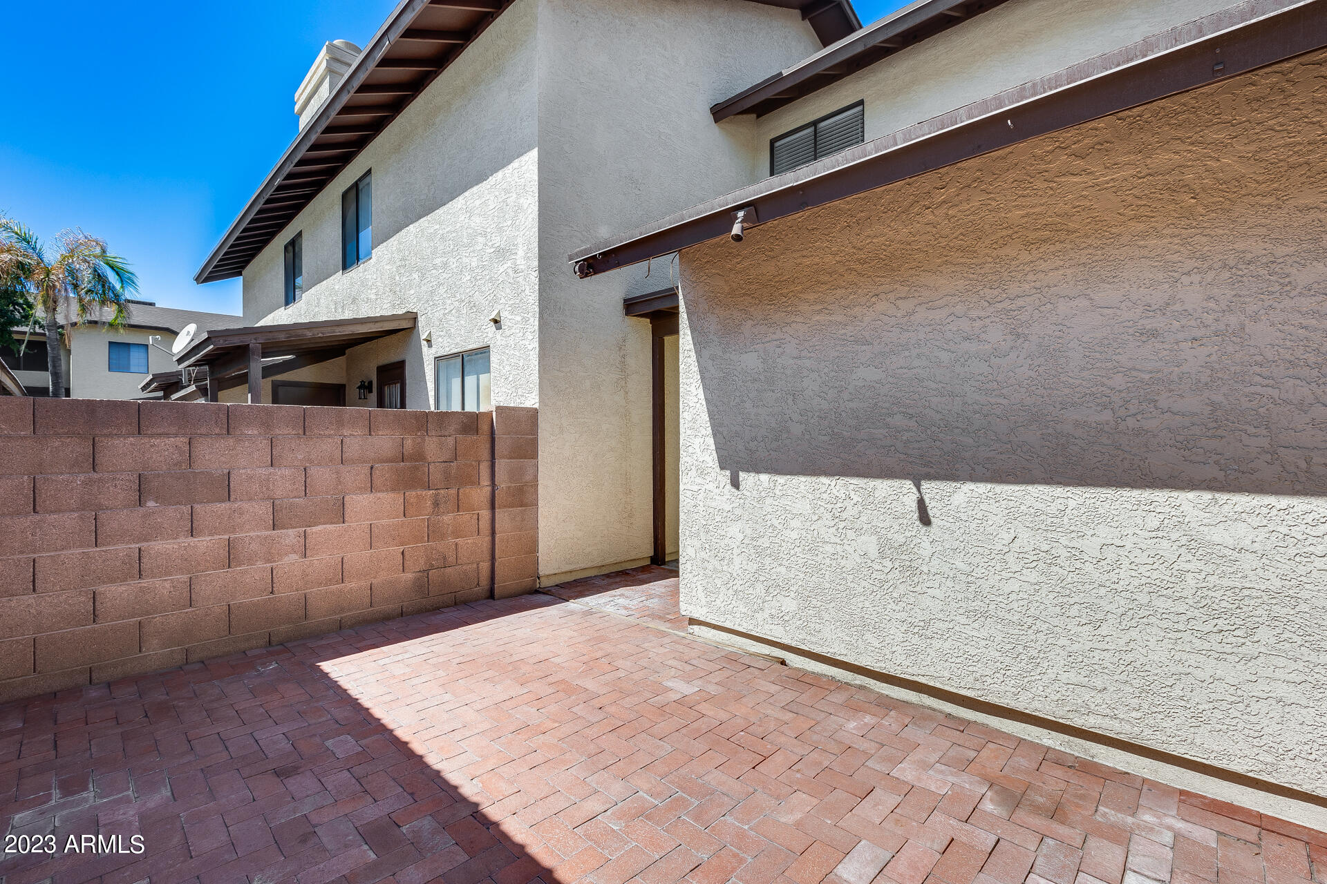 170 East Guadalupe Road, Unit 77 Gilbert, AZ 85234 - Photo 29 of 31 a view of a back yard of the house