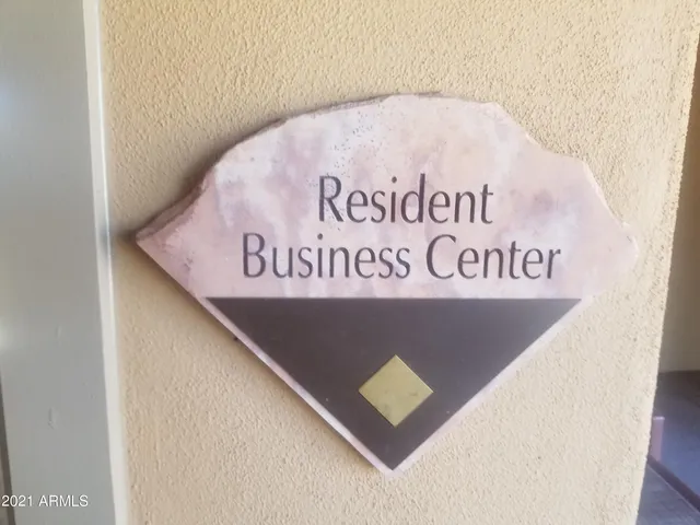 a sign that is on the wall of a building