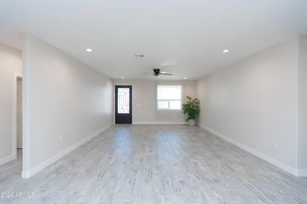 a view of a room and window in a room