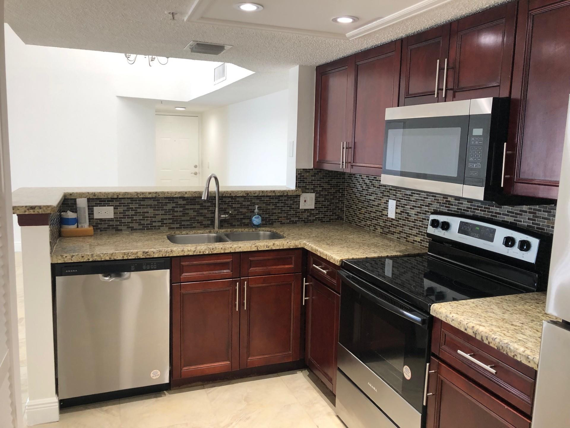 5045 Wiles Road, Unit 306 Coconut Creek, FL 33073 - Photo 4 of 33 Photo 4