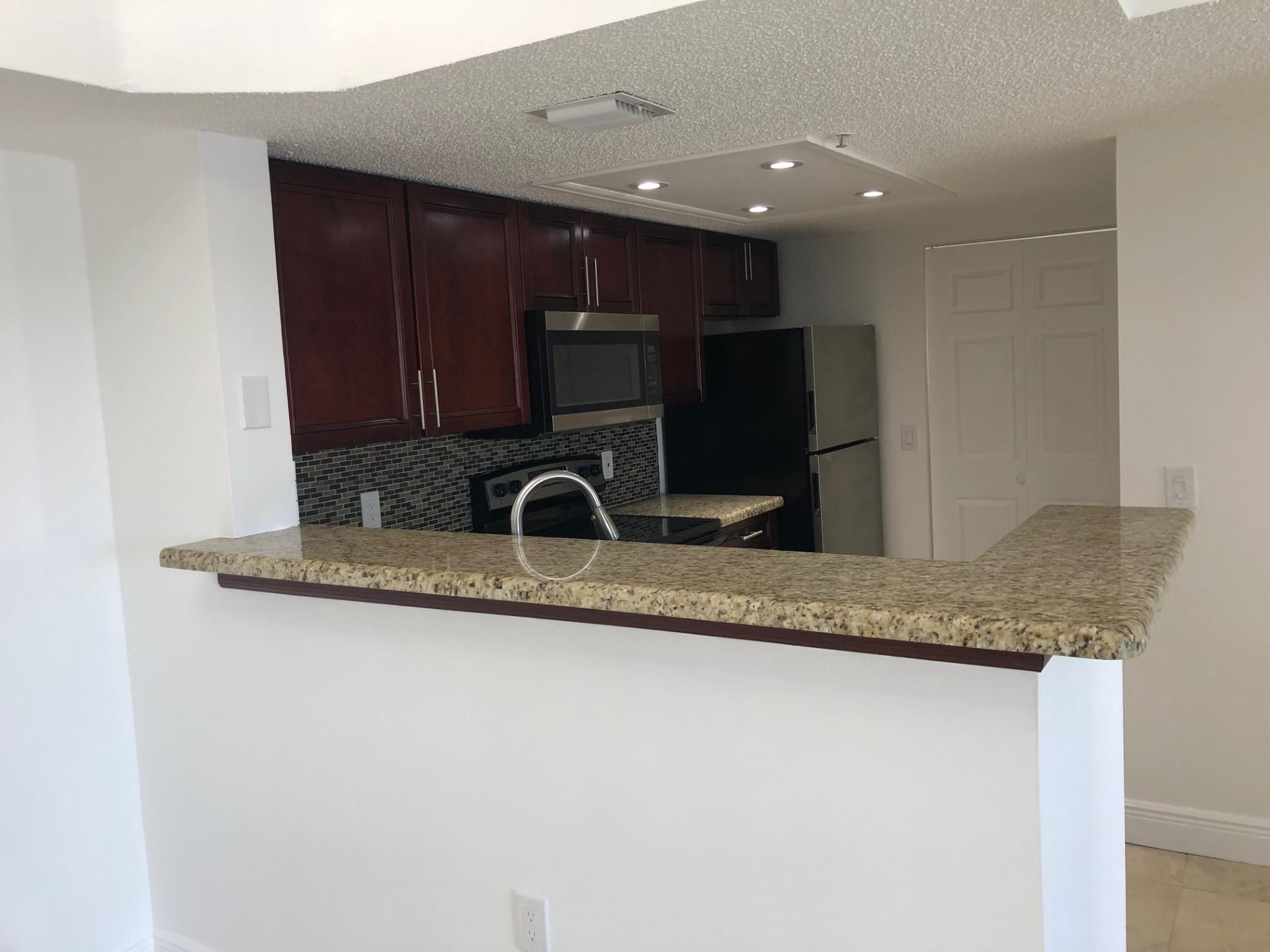 5045 Wiles Road, Unit 306 Coconut Creek, FL 33073 - Photo 6 of 33 Photo 6