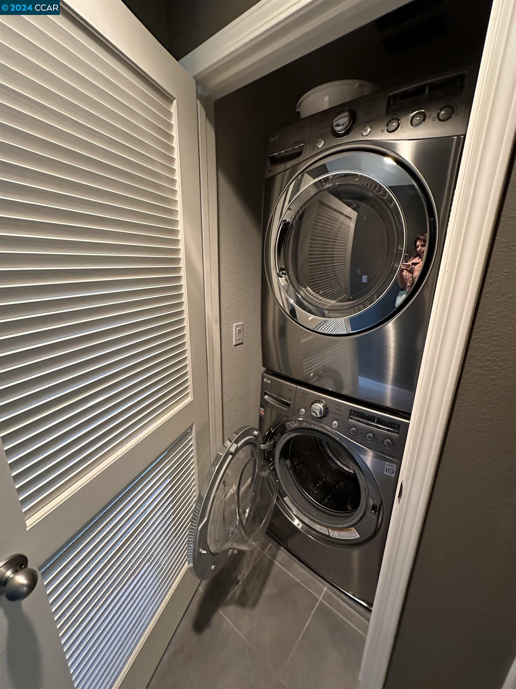 830 El Paseo Circle Walnut Creek, CA 94597 - Photo 11 of 16 a utility room with dryer and washer