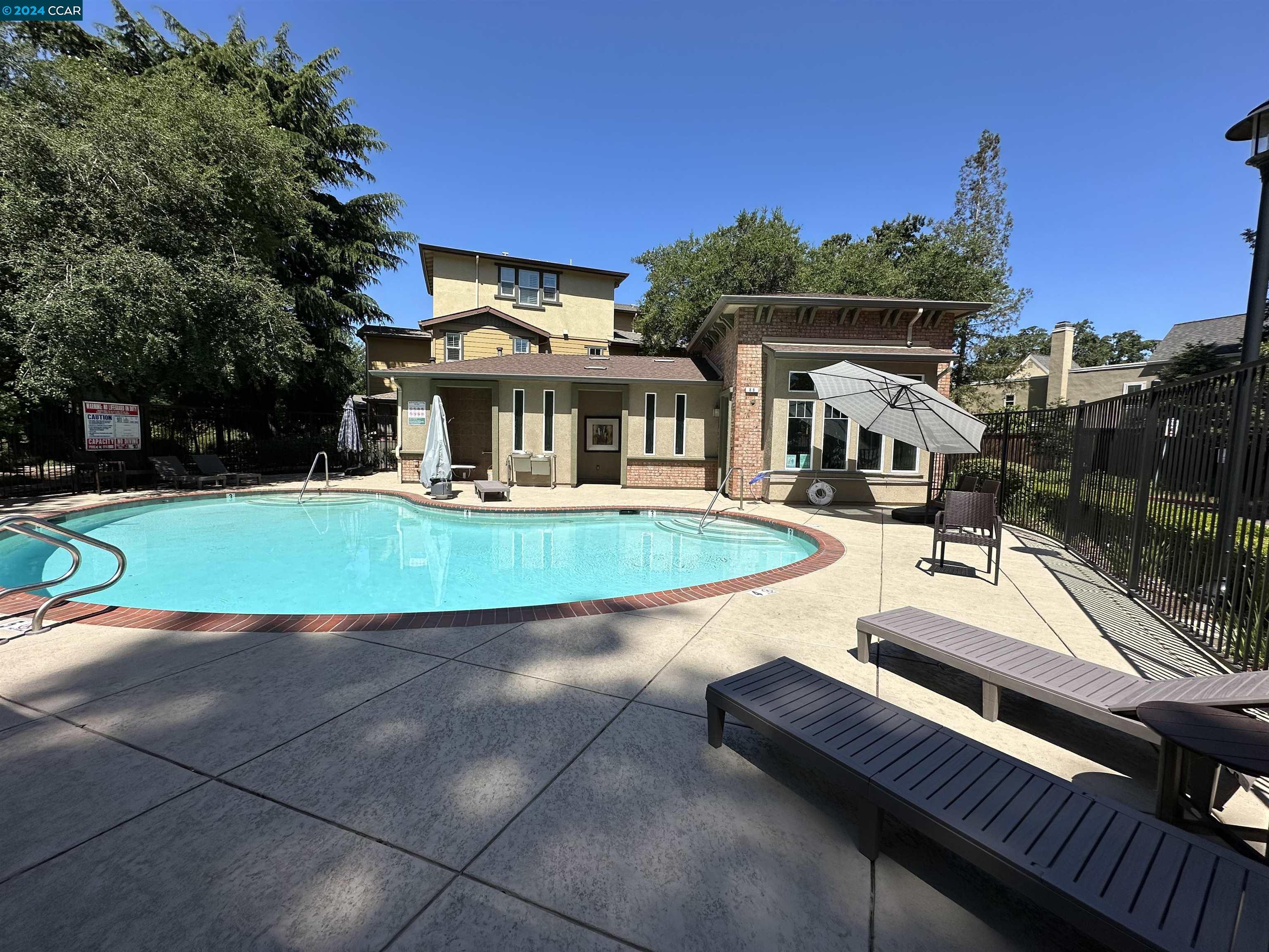 830 El Paseo Circle Walnut Creek, CA 94597 - Photo 14 of 16 a view of a house with a yard