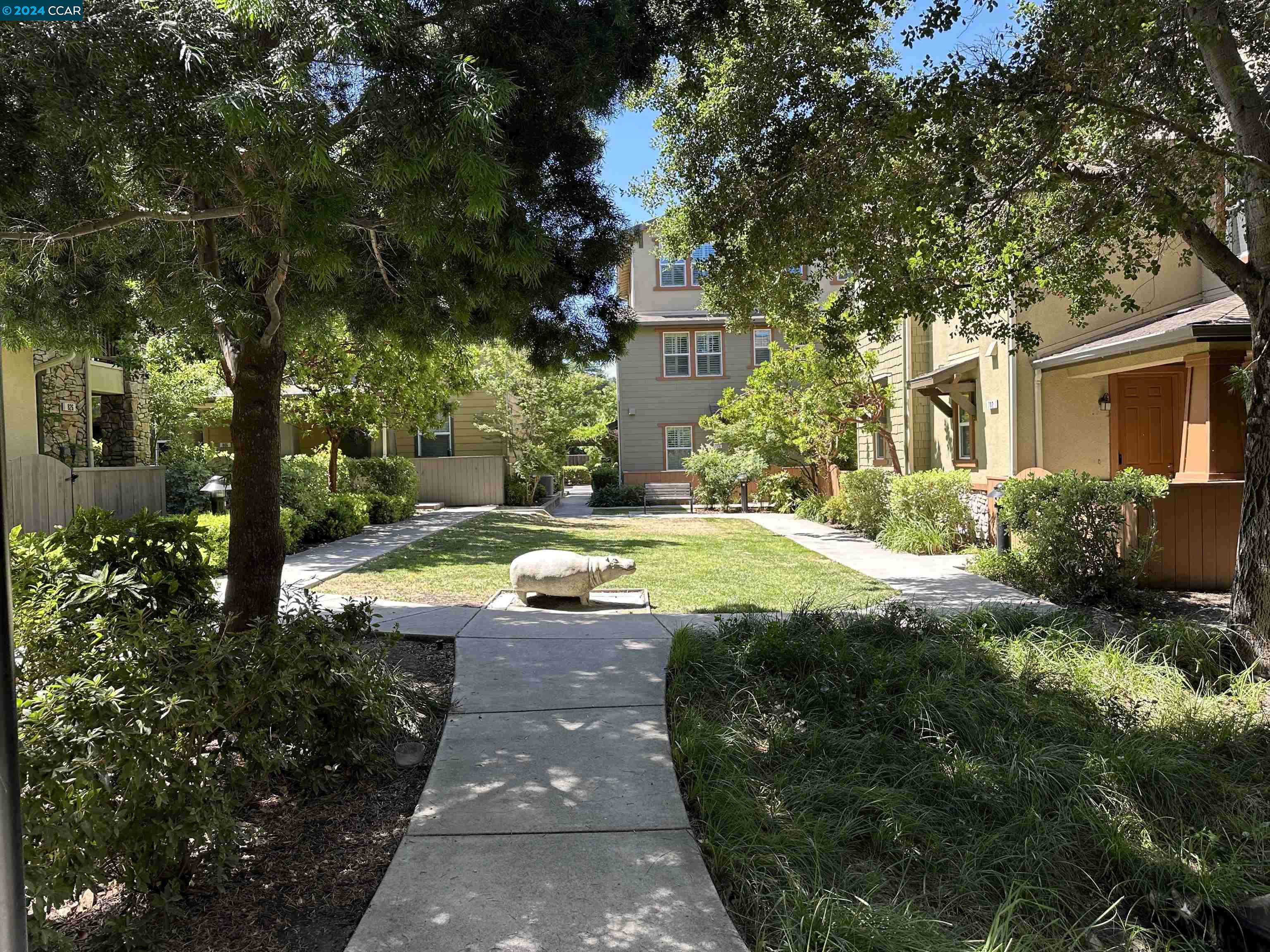 830 El Paseo Circle Walnut Creek, CA 94597 - Photo 15 of 16 a view of swimming pool with a garden