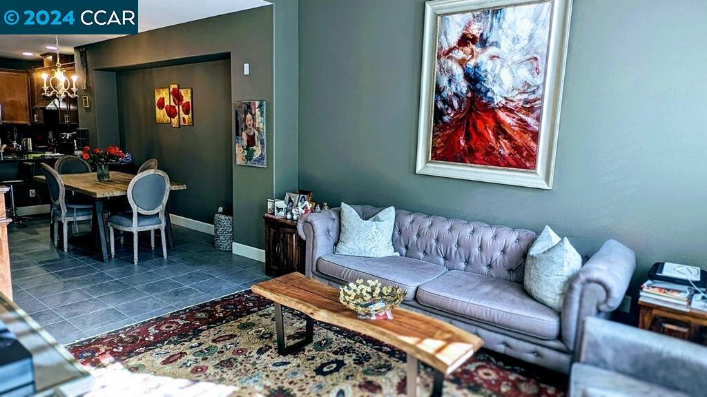 830 El Paseo Circle Walnut Creek, CA 94597 - Photo 3 of 16 a living room with furniture and a rug